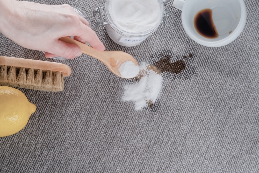 Closeup of spot cleaning a stain in the carpet